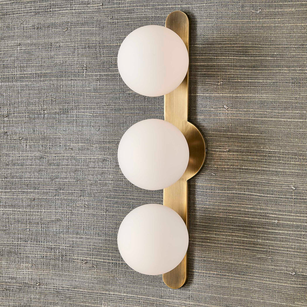 Mid century modern wall sconce with opal glass globes