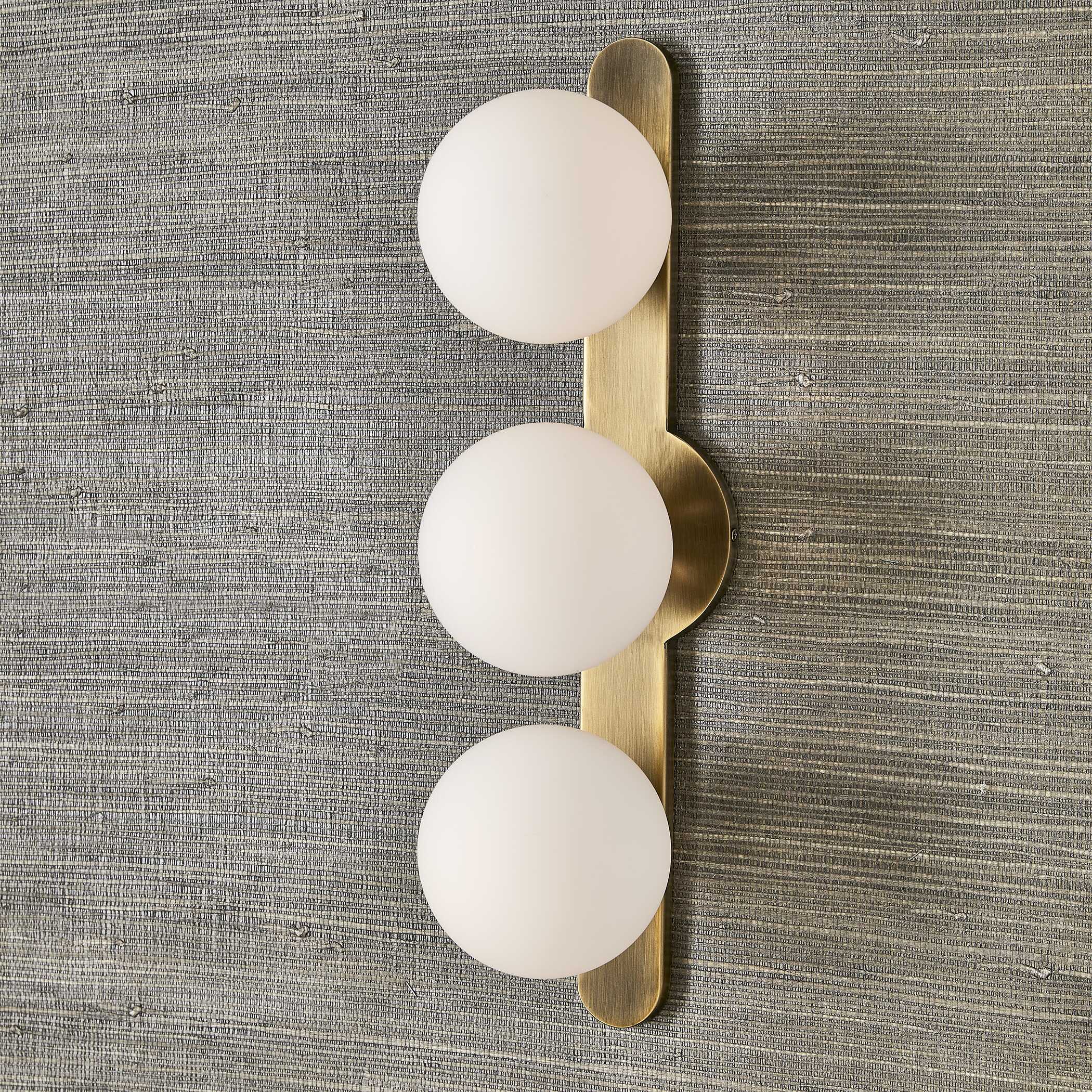 Mid century modern wall sconce with opal glass globes