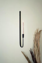 Forged iron single taper wall sconce in black finish