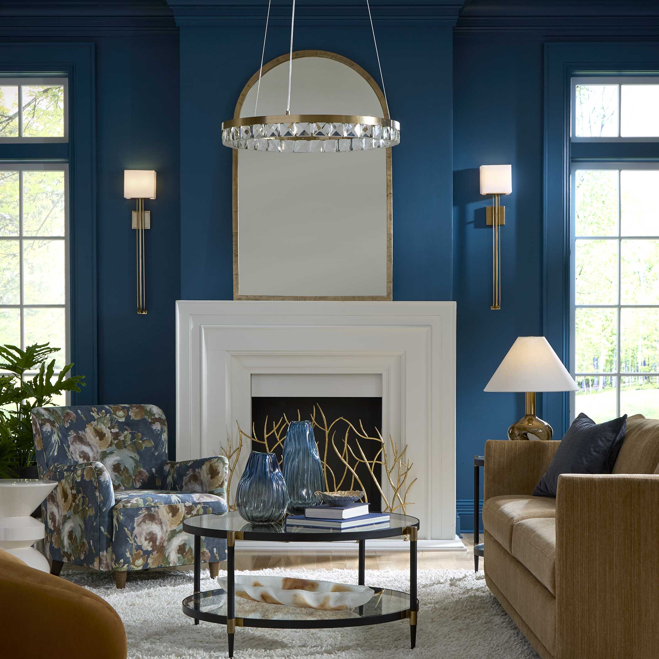 Warm brass wall sconce adding ambient lighting to a hallway